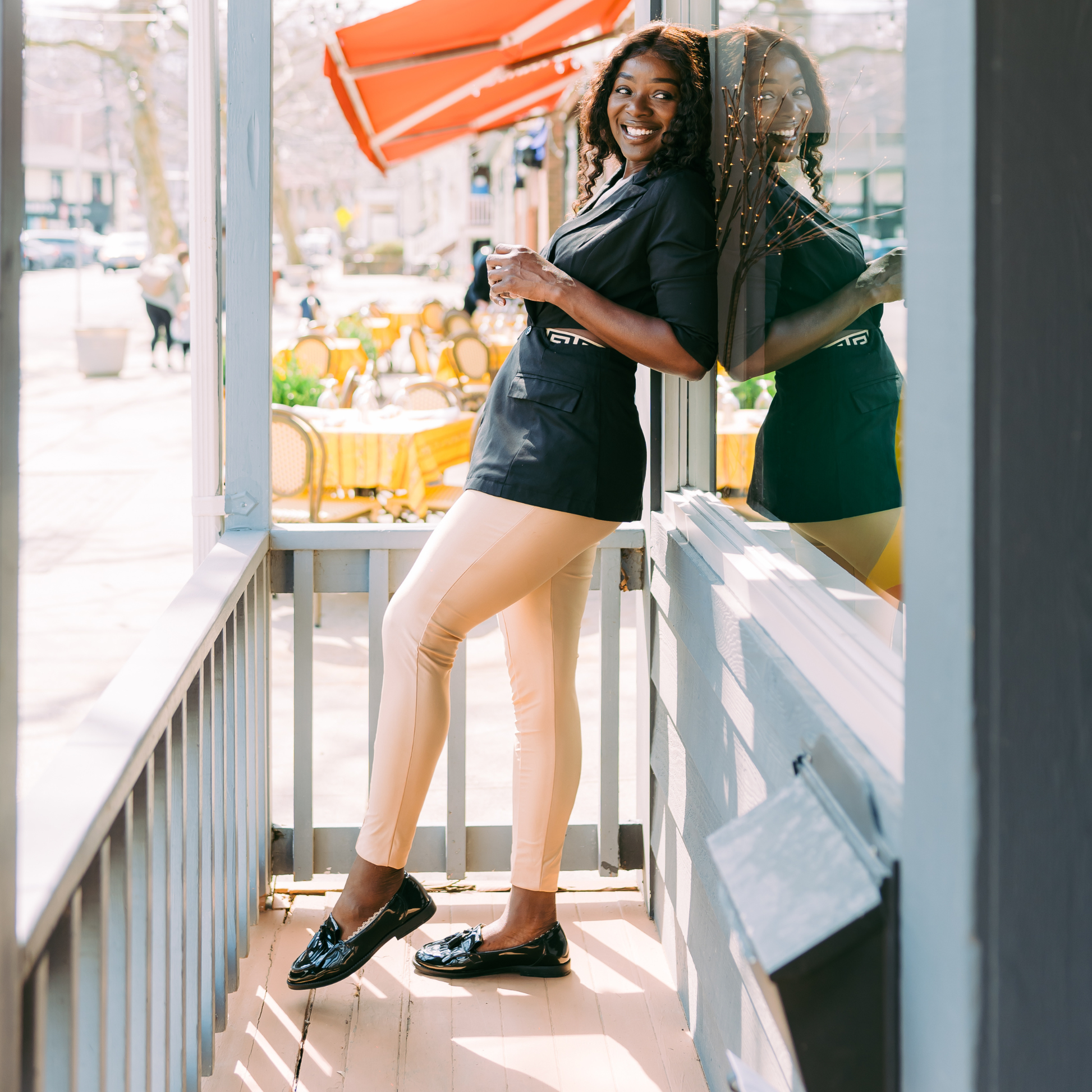 African American woman wearing nude no-show footies with black loafers - chic Arbella Style low-cut socks