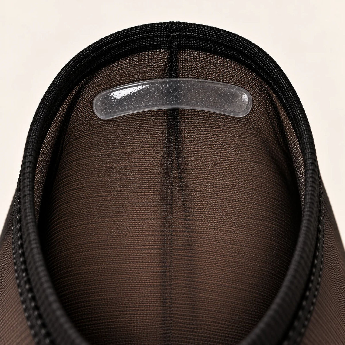Traditional women's no-show footie sock with a single silicone heel grip inside the heel.