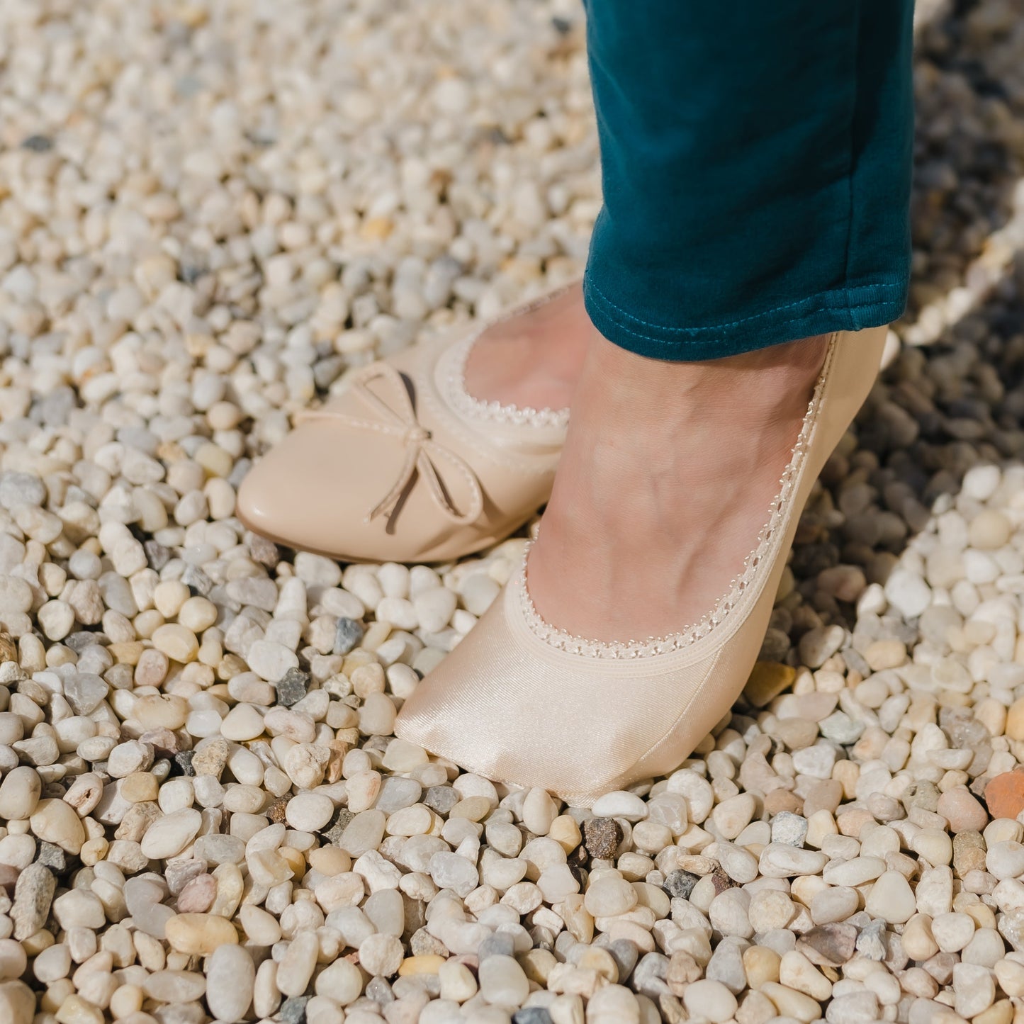 Sand nude footie in sunlight showing beautiful shimmery fabric - Arbella Style luxe finish
