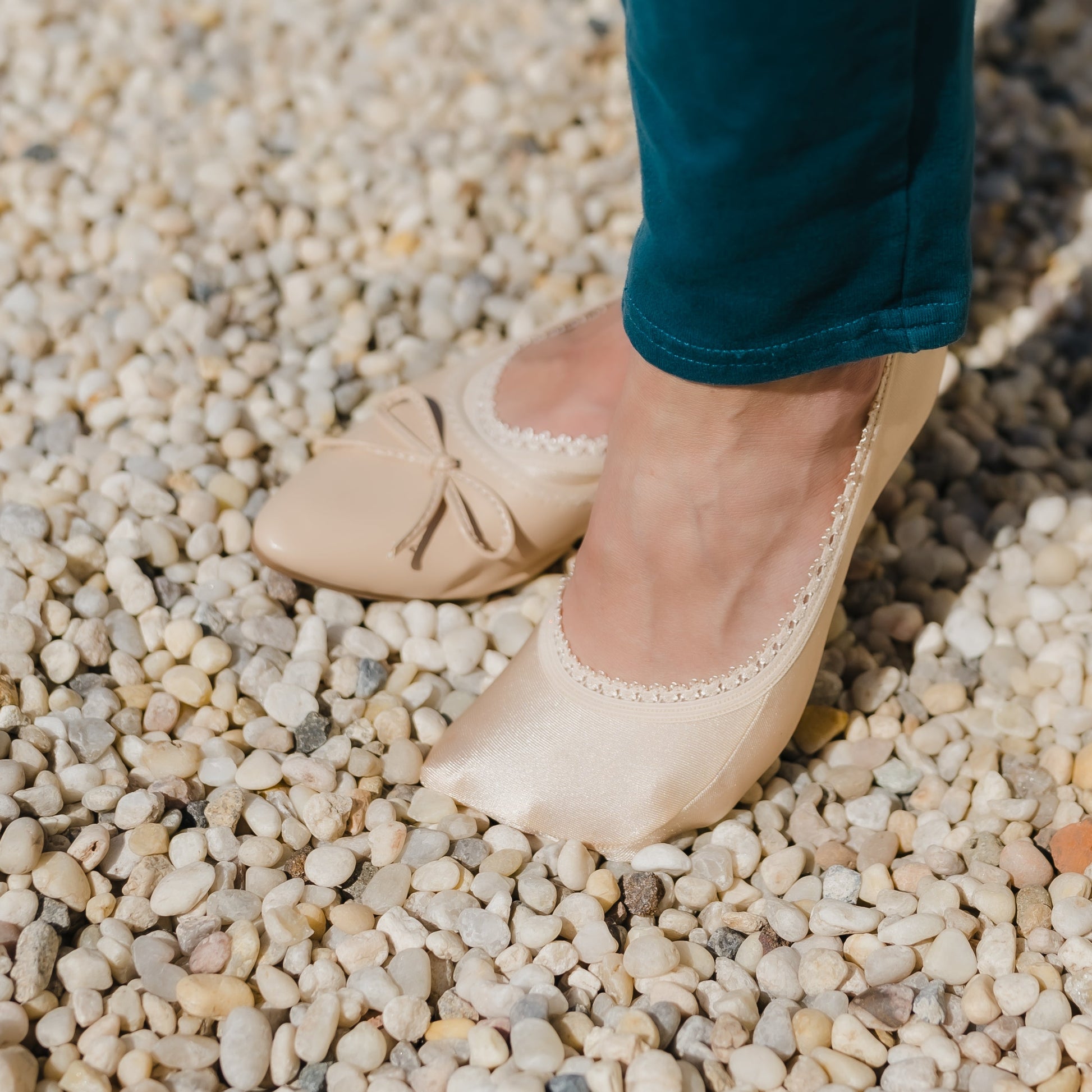 Sand nude footie in sunlight showing beautiful shimmery fabric - Arbella Style luxe finish