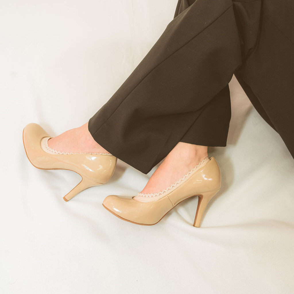 Side view of nude patent leather heels with nude footie lace edge peeking out - Arbella Style elegant detail