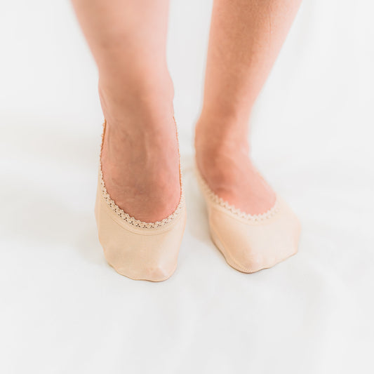 White woman modeling nude colored footies - Arbella Style silky soft no-show socks