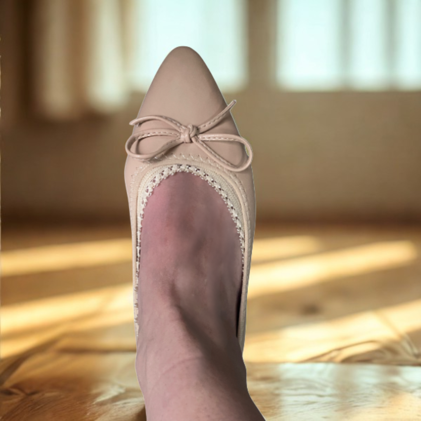 White woman wearing nude ballerina flat with lace edge peeking out - Arbella Style beige footie detail