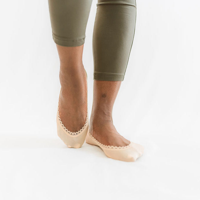 White woman modeling nude colored footies - Arbella Style silky soft no-show socks